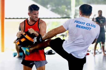 Mastering Muay Thai Pad Work Combinations for Effective Striking